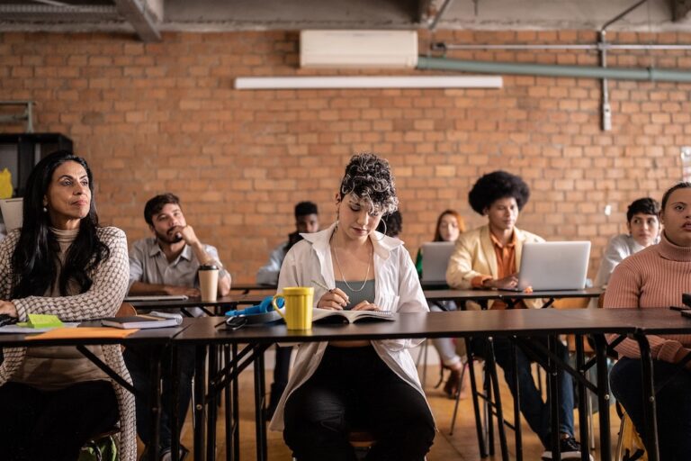 Students during class in the university – including a person with special needs